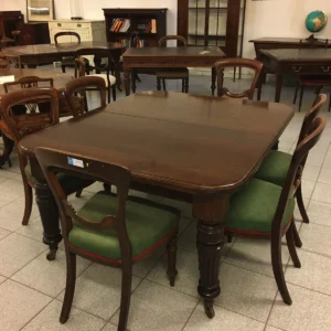Antico tavolo allungabile in mogano